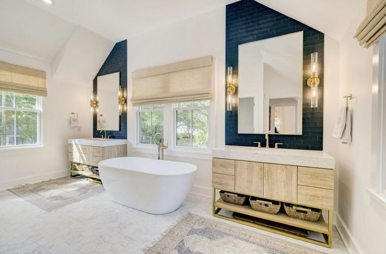 Primary bathroom remodel with freestanding tub and dual vanities